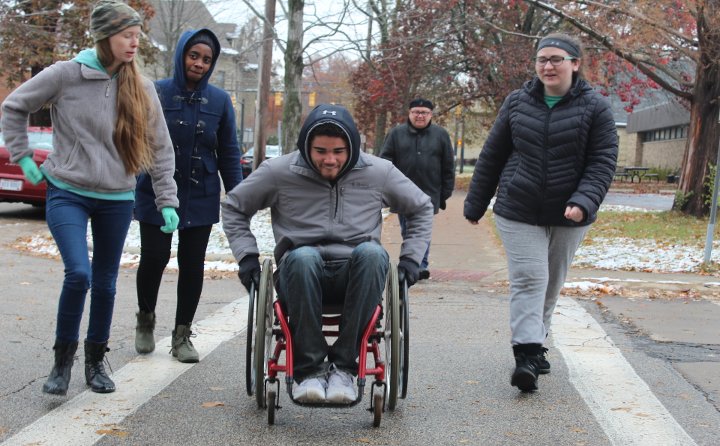 Student conducting wheelchair experiment